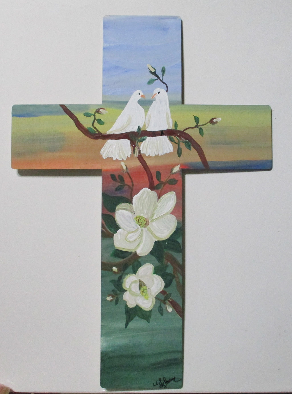 Wooden cross art doves and magnolia blossoms