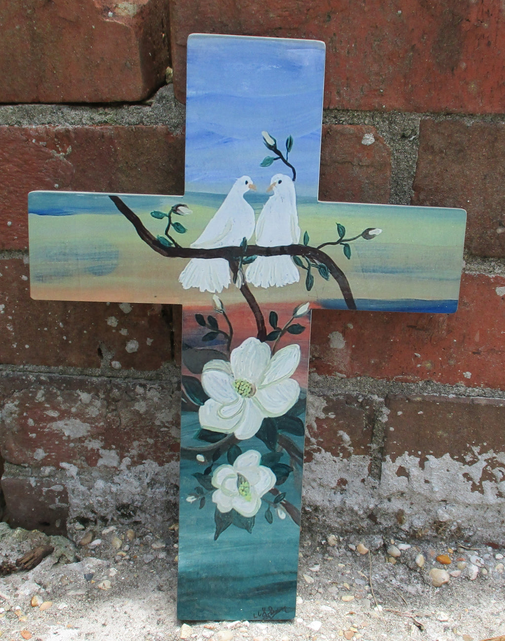 Wooden cross art doves and magnolia blossoms