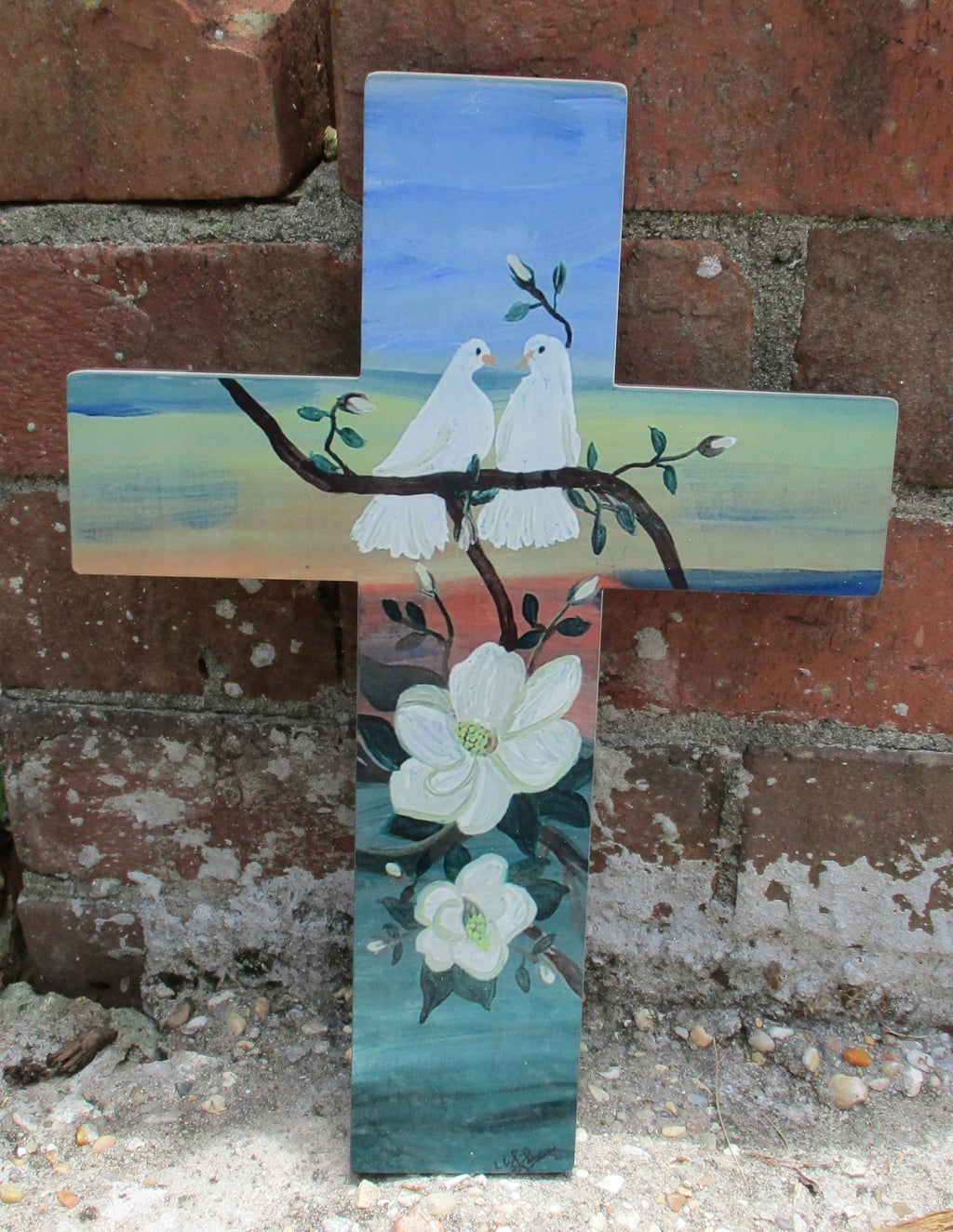 Wooden cross art doves and magnolia blossoms